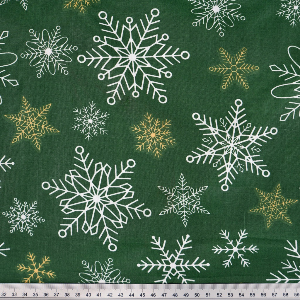 Tissu Coton Noël Flocons Festifs Fond Vert | Laize 1m55
